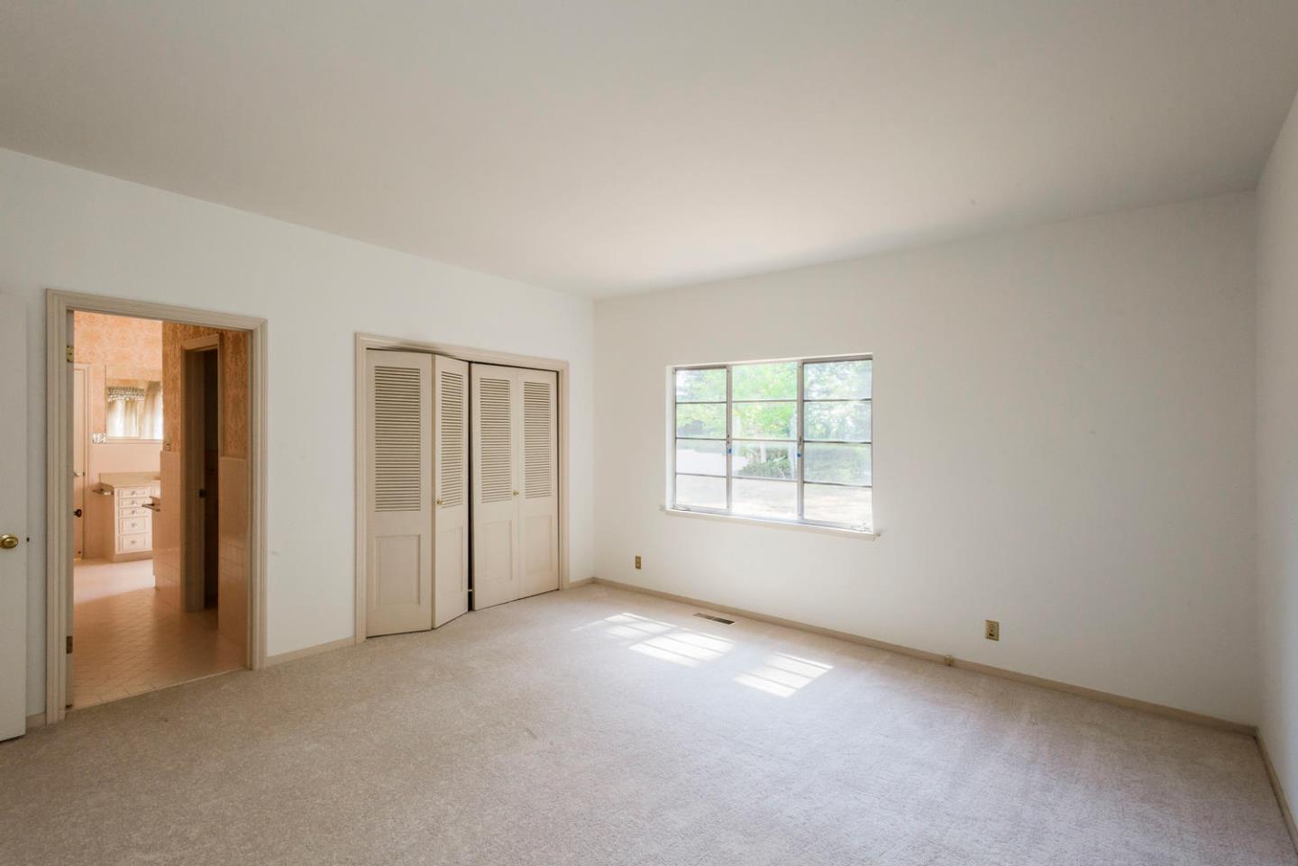 460 Pullman Road Hillsborough, CA 94010 - Photo 21 of 34 an empty room with windows