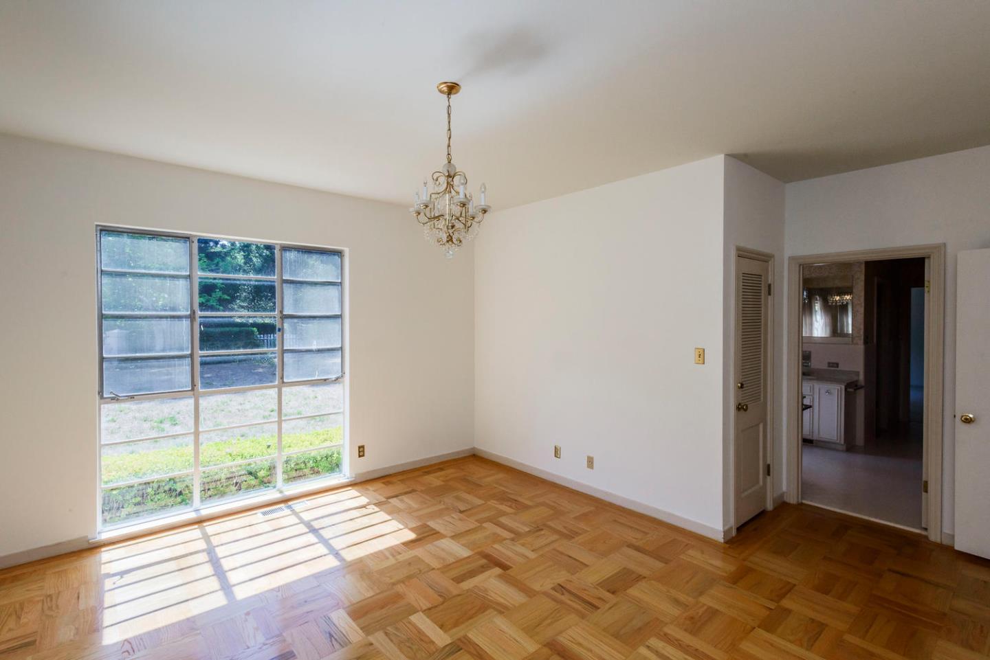 460 Pullman Road Hillsborough, CA 94010 - Photo 22 of 34 a view of an empty room with a window