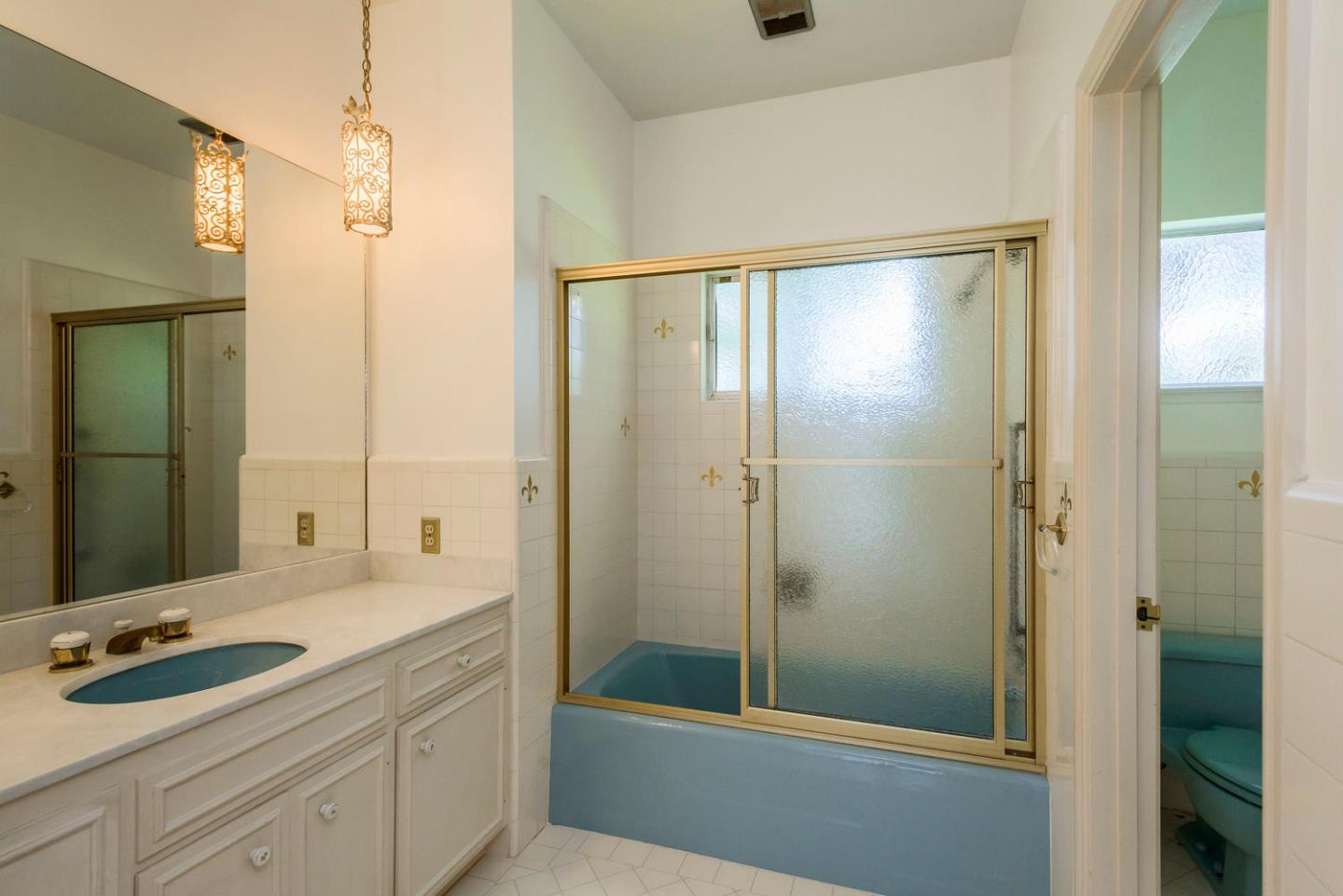 460 Pullman Road Hillsborough, CA 94010 - Photo 26 of 34 a bathroom with a sink and a mirror
