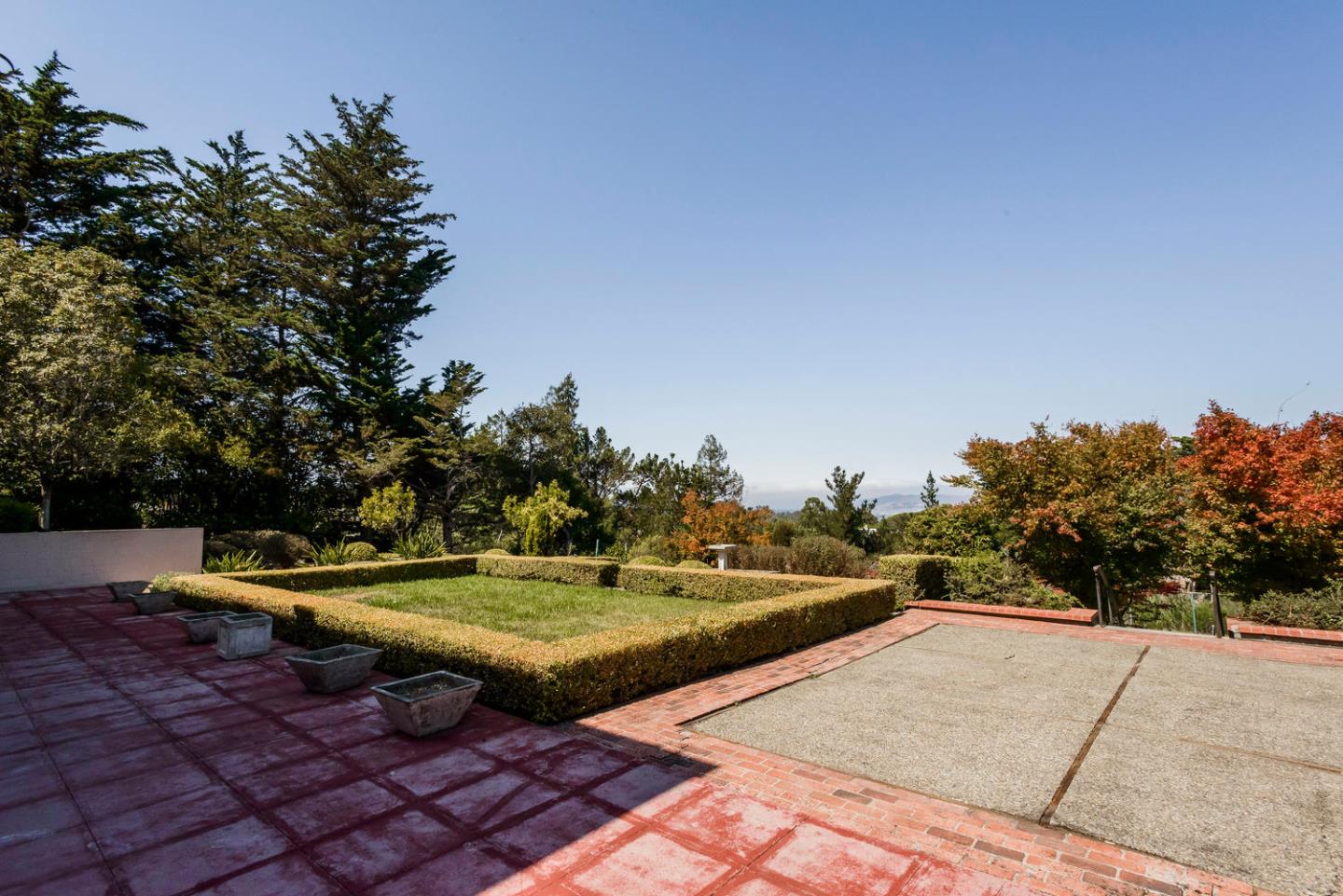 460 Pullman Road Hillsborough, CA 94010 - Photo 34 of 34 a view of a swimming pool with a yard and large trees