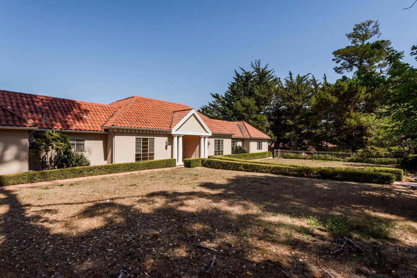 460 Pullman Road Hillsborough, CA 94010 - Photo 5 of 34 a house with trees in the background