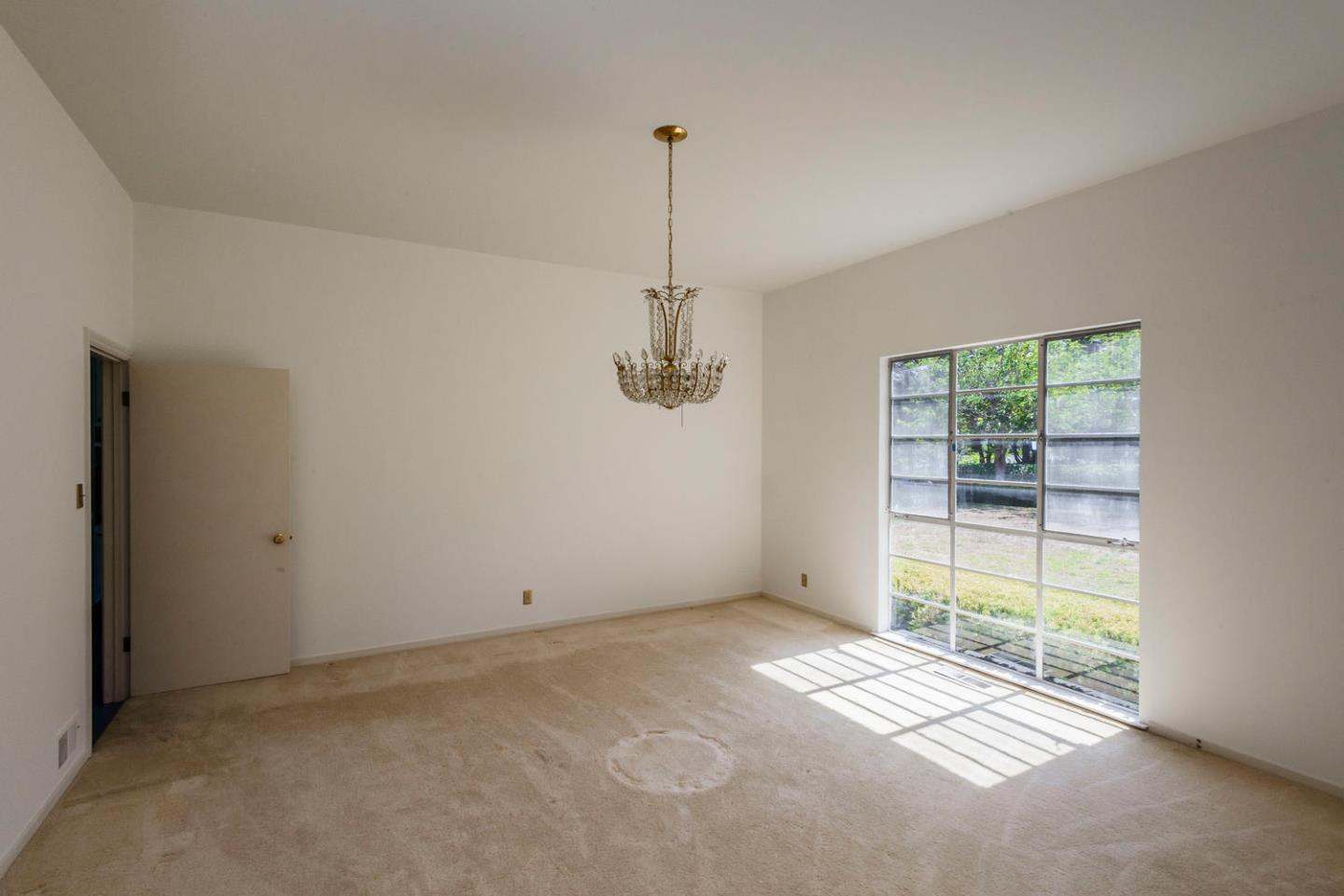 460 Pullman Road Hillsborough, CA 94010 - Photo 9 of 34 a view of an empty room with window