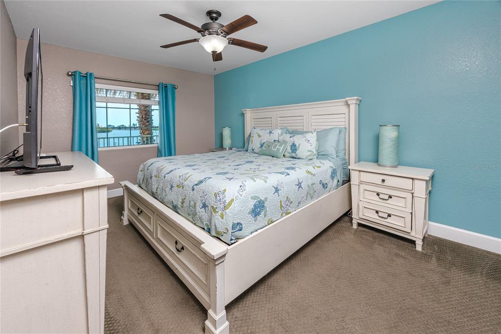 399 2nd Street, Unit 217 Indian Rocks Beach, FL 33785 - Photo 15 of 44 a bed room with a bed and a window