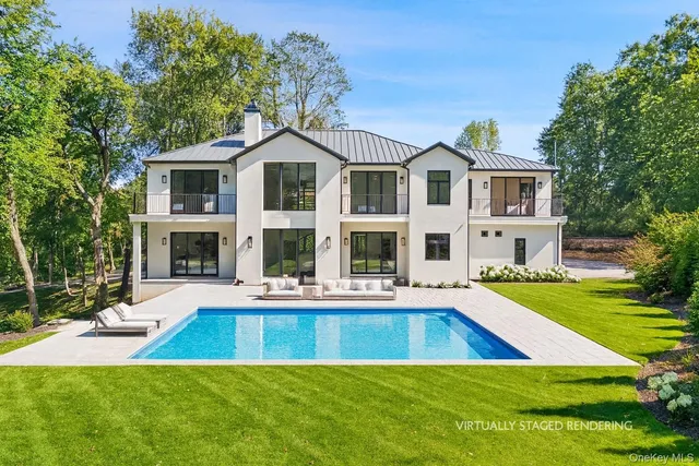 a view of a house with a swimming pool