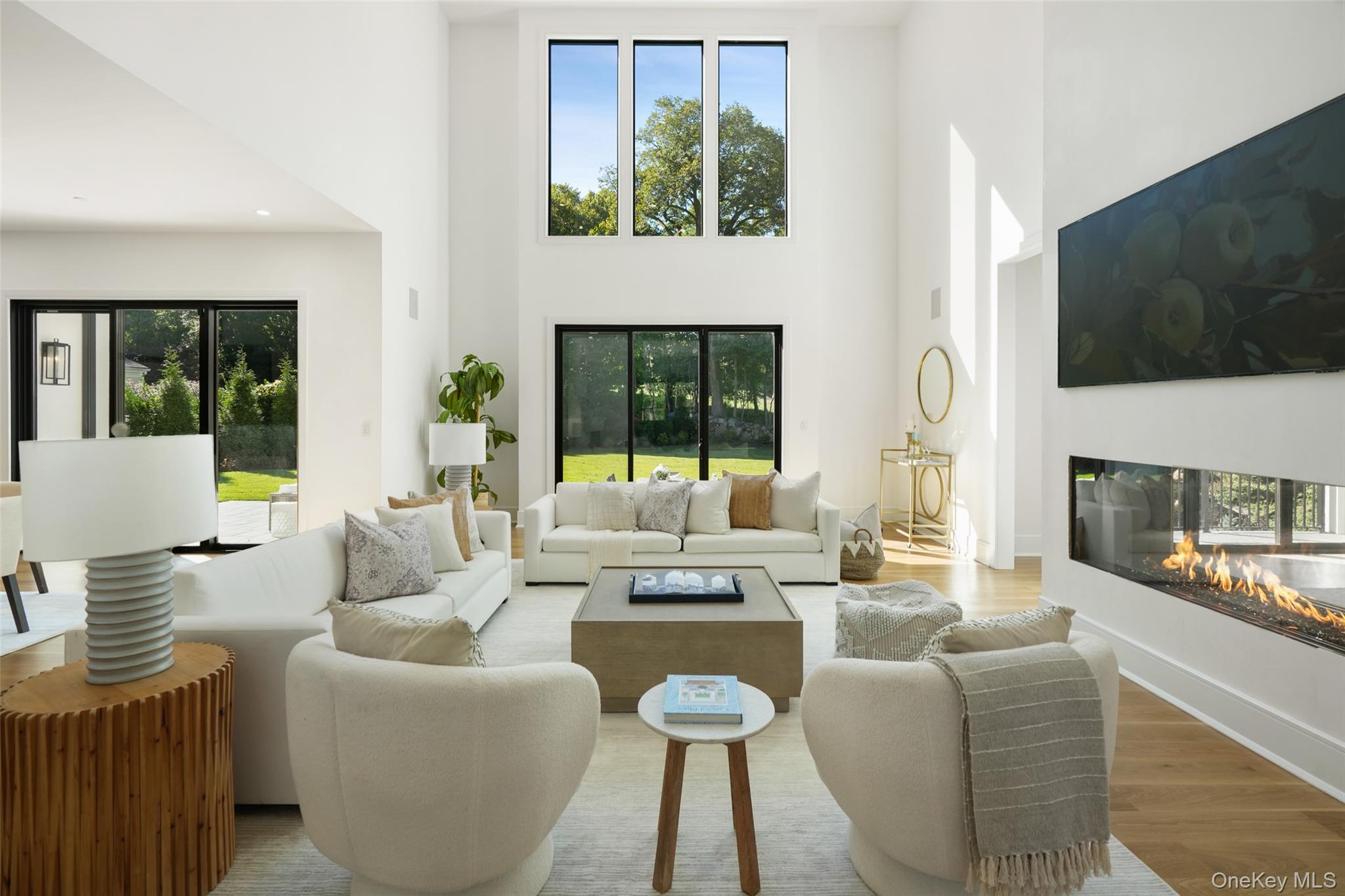 11 Boxwood Lane Rye, NY 10580 - Photo 5 of 29 a living room with fireplace furniture and a flat screen tv