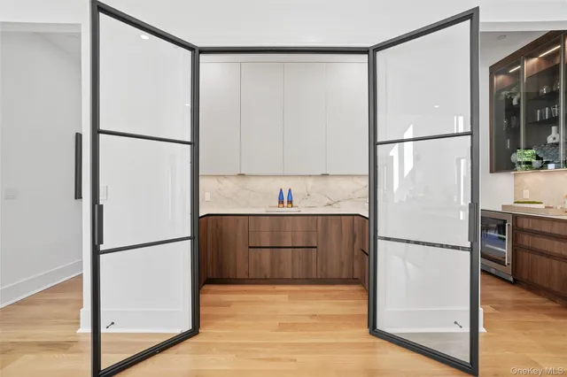 a refrigerator freezer sitting in a kitchen with stainless steel appliances granite countertop white refrigerator freezer and a dishwasher