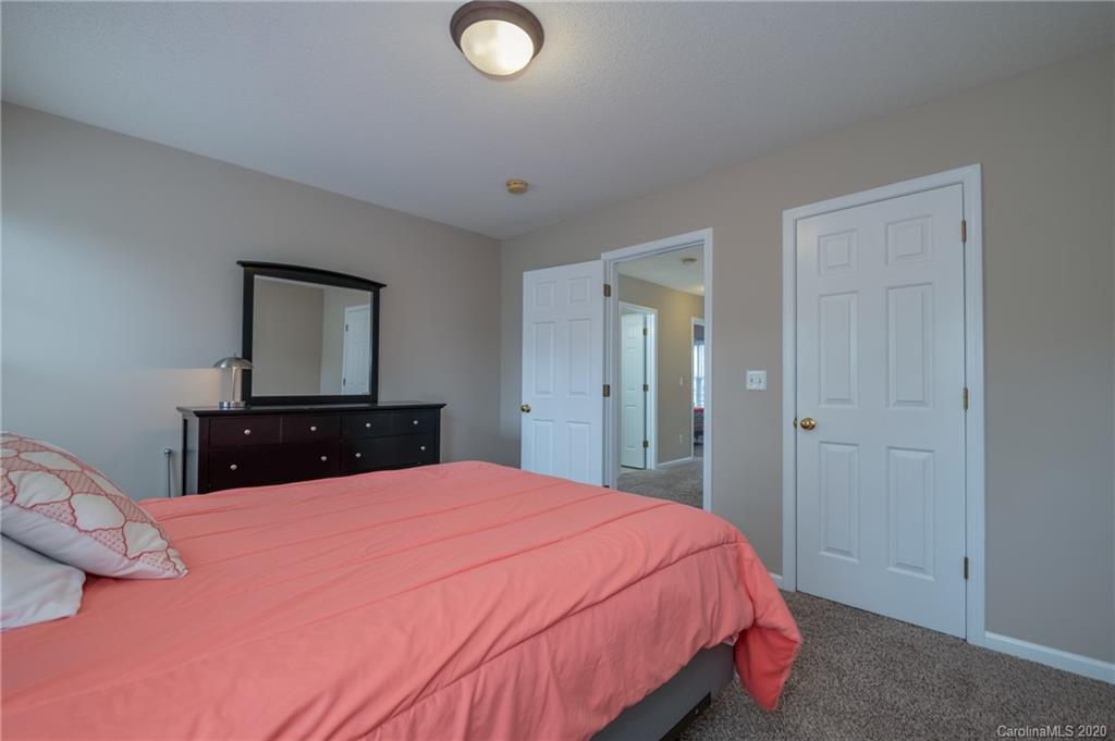 52 Wildbriar Road Fletcher, NC 28732 - Photo 21 of 29 a bed room with a bed and a television