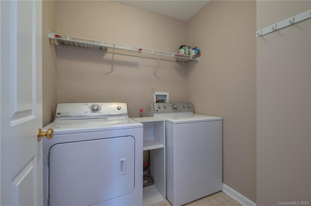 52 Wildbriar Road Fletcher, NC 28732 - Photo 26 of 29 a utility room with dryer and washer