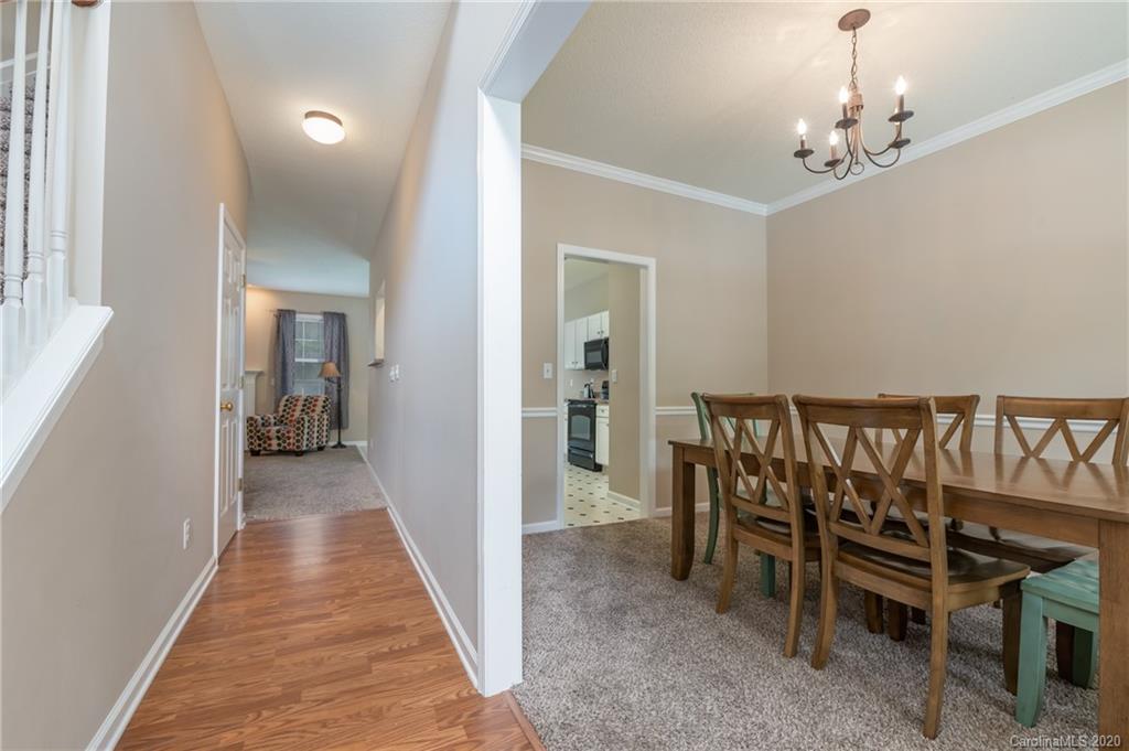 52 Wildbriar Road Fletcher, NC 28732 - Photo 5 of 29 a view of a hallway with a livingroom and furniture