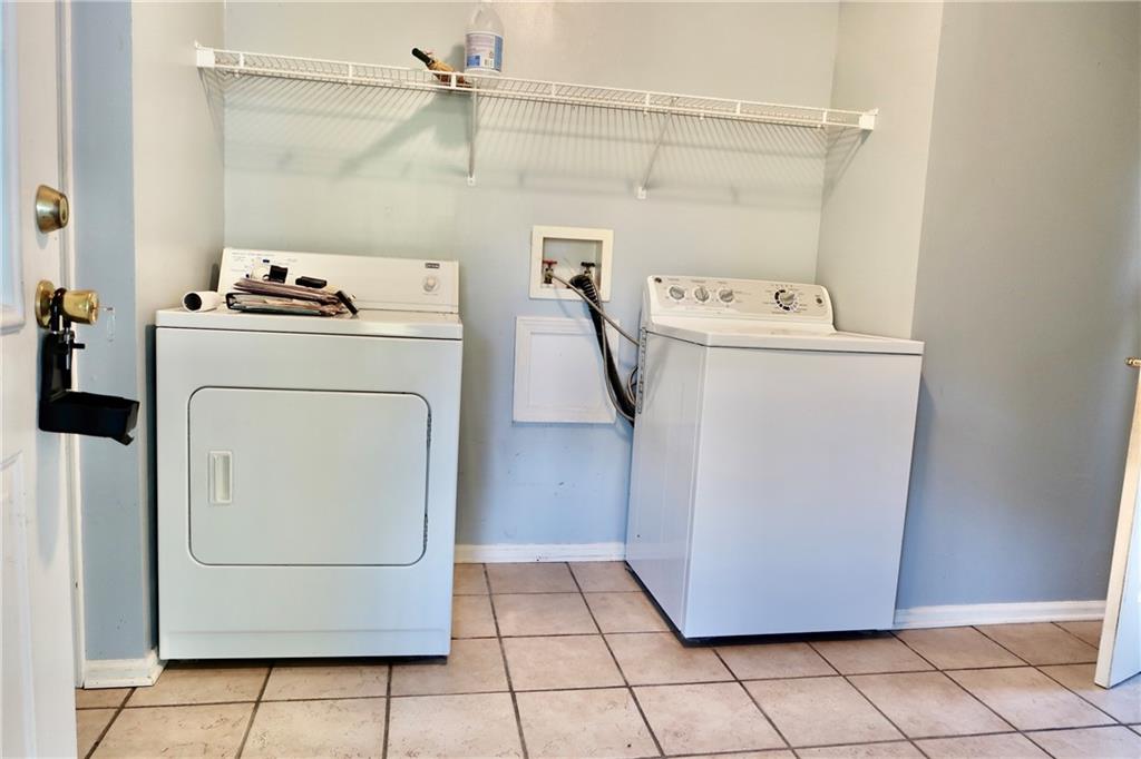 128 Airport Road Mercer, PA 16137 - Photo 21 of 36 a utility room with dryer and washer