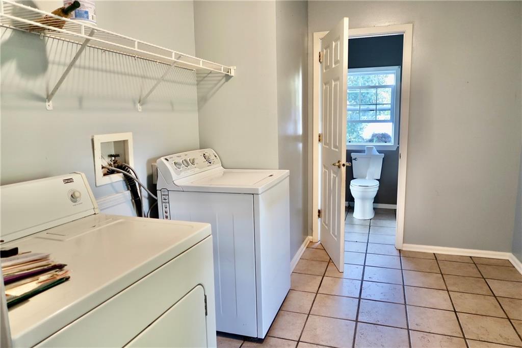 128 Airport Road Mercer, PA 16137 - Photo 22 of 36 a utility room with dryer and washer
