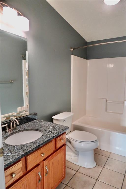 128 Airport Road Mercer, PA 16137 - Photo 23 of 36 a bathroom with a granite countertop sink and a mirror