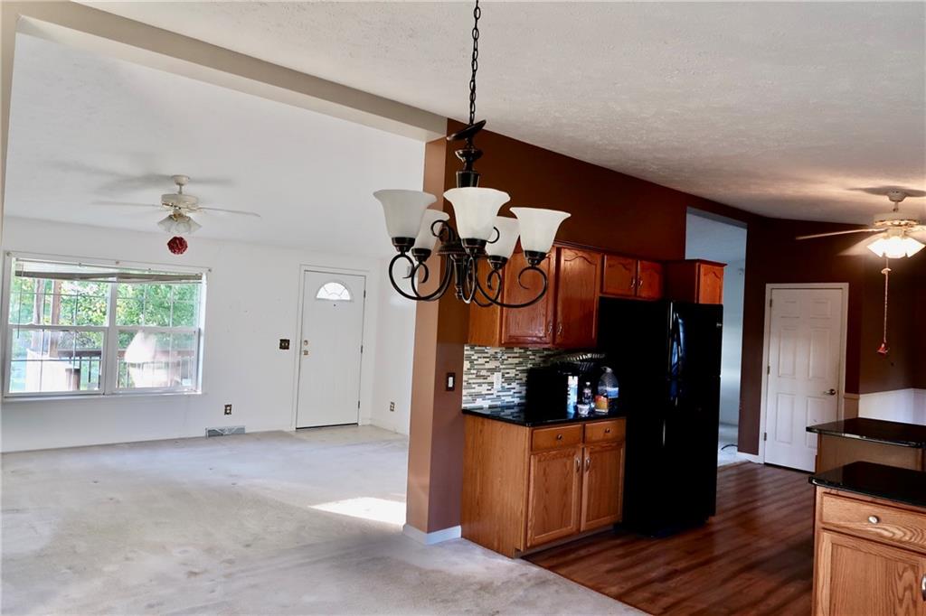 128 Airport Road Mercer, PA 16137 - Photo 26 of 36 a view of a room with window and wooden floor