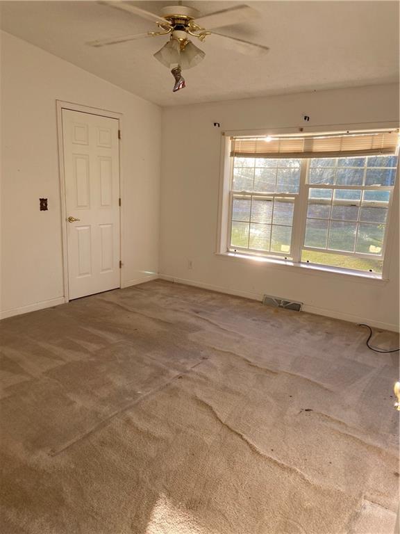 128 Airport Road Mercer, PA 16137 - Photo 30 of 36 a view of an empty room with a window