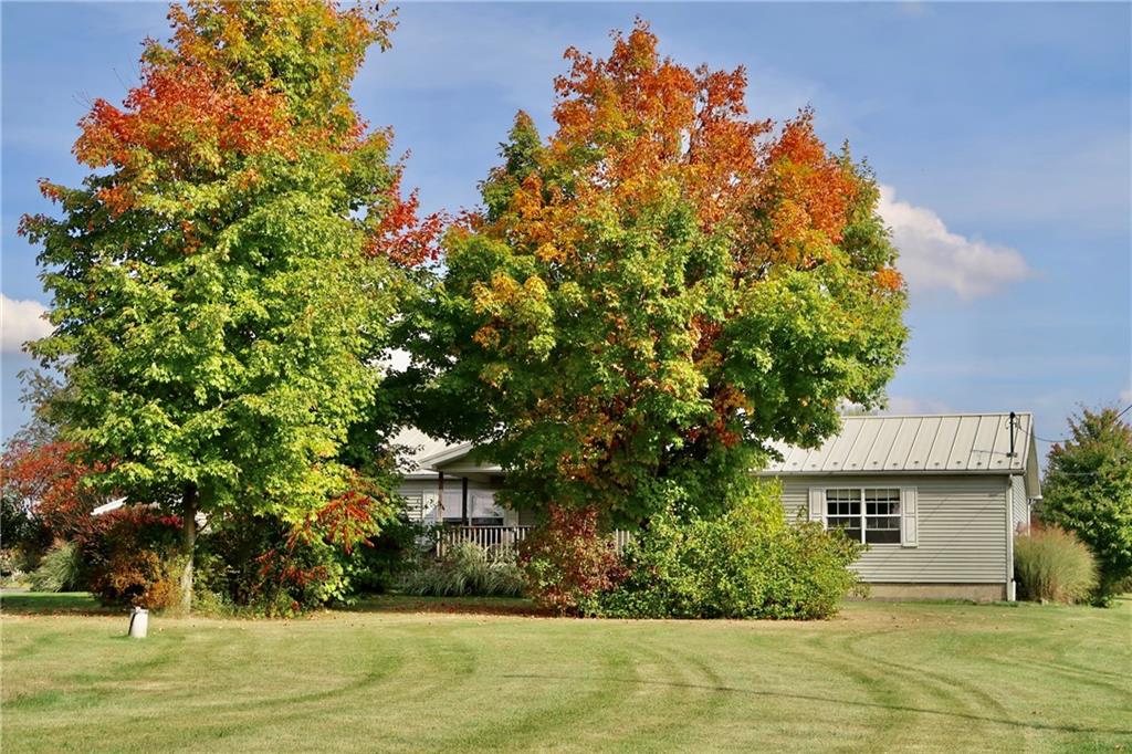128 Airport Road Mercer, PA 16137 - Photo 3 of 36 a front view of a house with a yard
