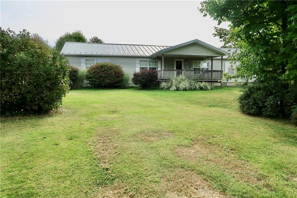 128 Airport Road Mercer, PA 16137 - Photo 36 of 36 a front view of a house with garden