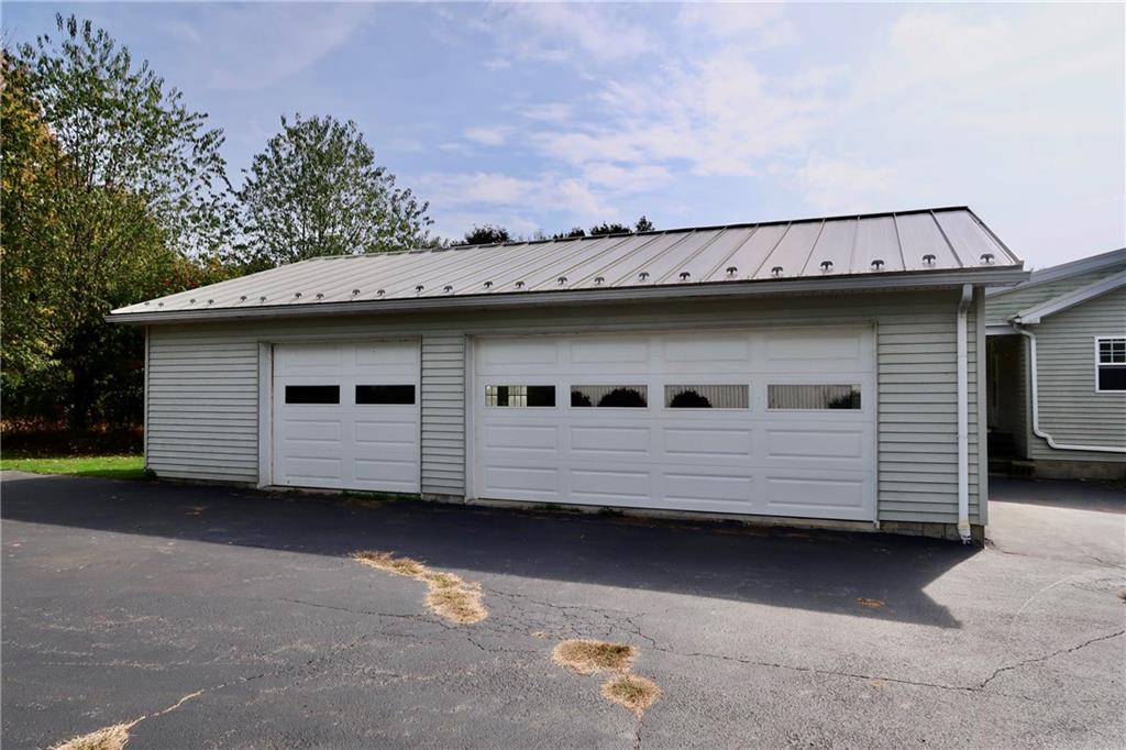 128 Airport Road Mercer, PA 16137 - Photo 6 of 36 a view of a house with a backyard