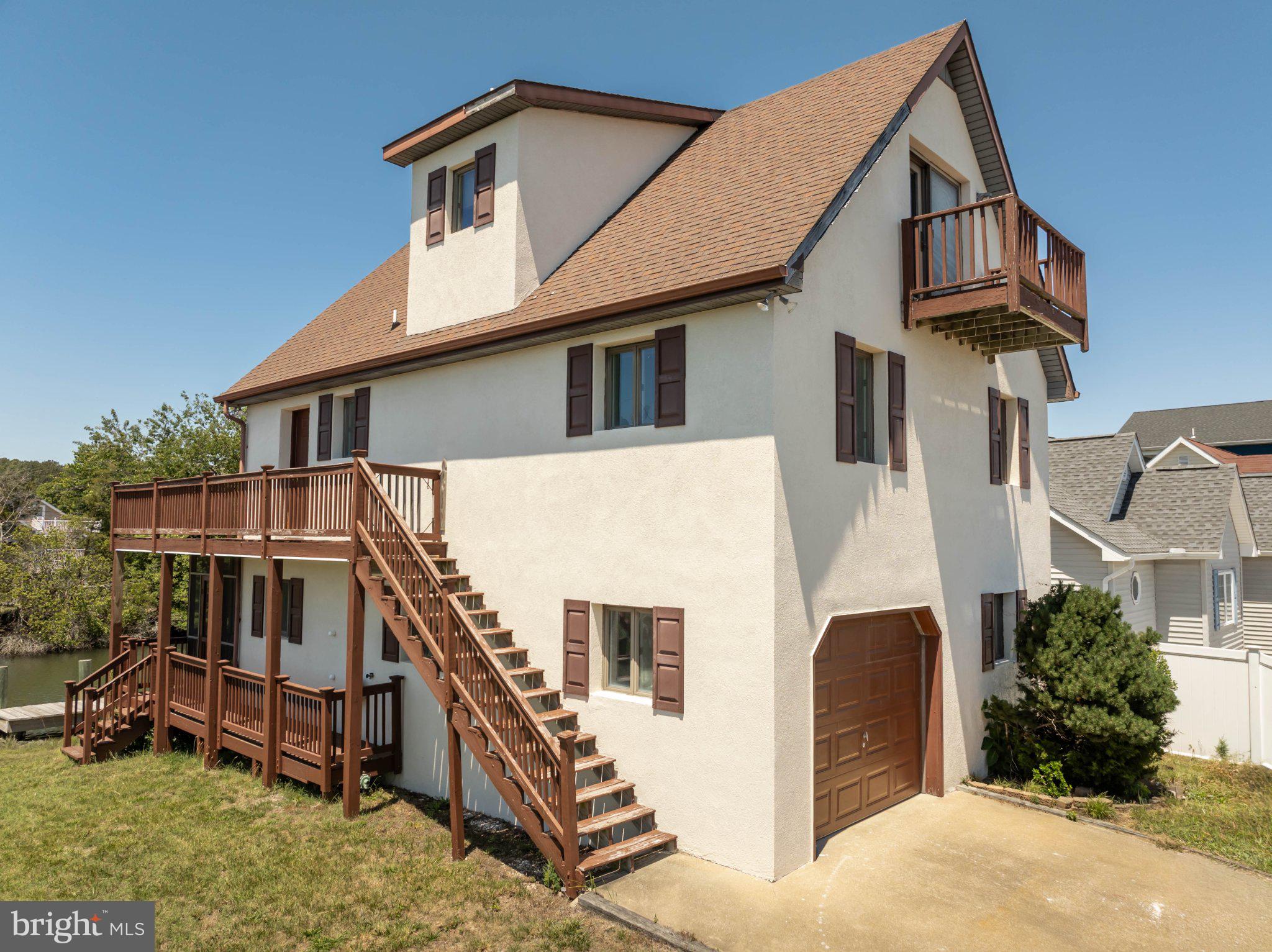 10431 Brighton Road Ocean City, MD 21842 - Photo 58 of 75 Charming lakeside retreat with balconies.