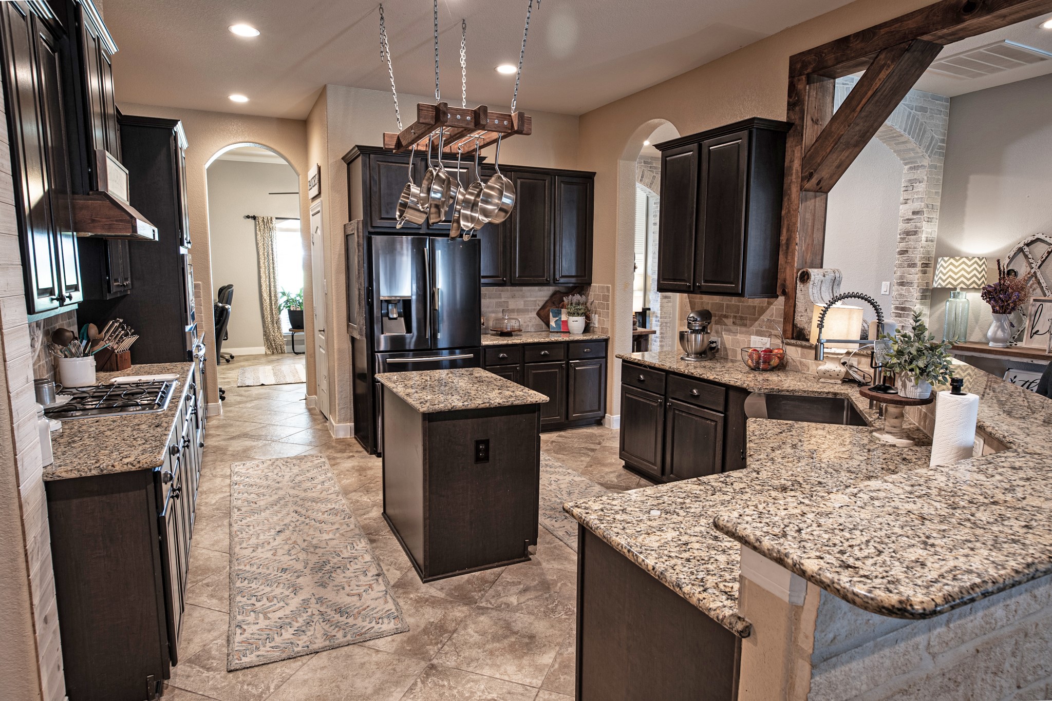 1283 Laurel Lane Angleton, TX 77515 - Photo 13 of 40 Dark Wood Cabinets in this Chefs Kitchen. Everything you would want in a Kitchen.