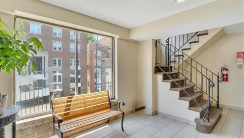 a view of entryway with a front door