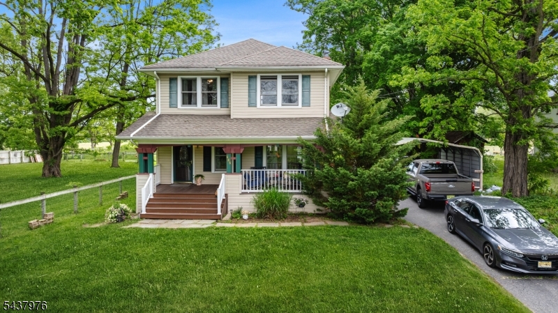886 Brass Castle Road Belvidere, NJ 07823 - Photo 2 of 44 a front view of a house with garden