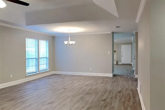 wooden floor and windows in a room