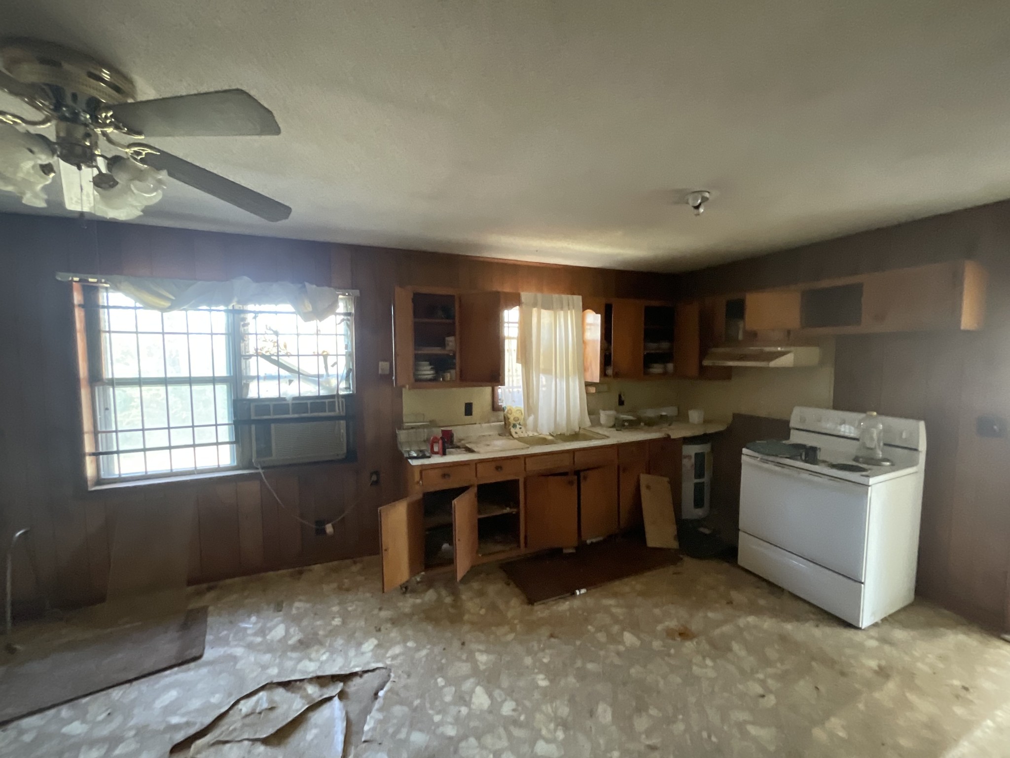 1035 Rube Scott Road Grand Junction, TN 38039 - Photo 17 of 22 a large kitchen with kitchen island a stove a sink dishwasher and a oven