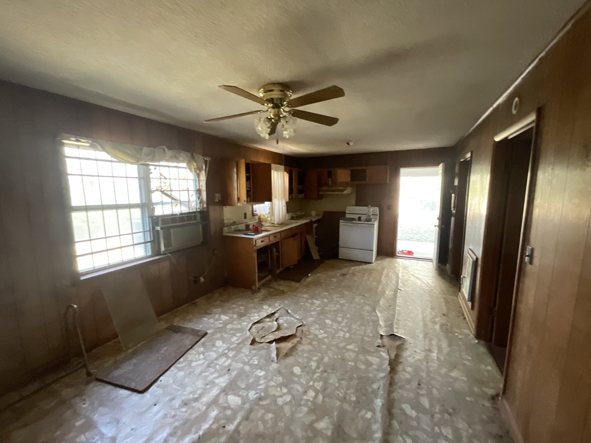 1035 Rube Scott Road Grand Junction, TN 38039 - Photo 3 of 22 a open kitchen with refrigerator and window