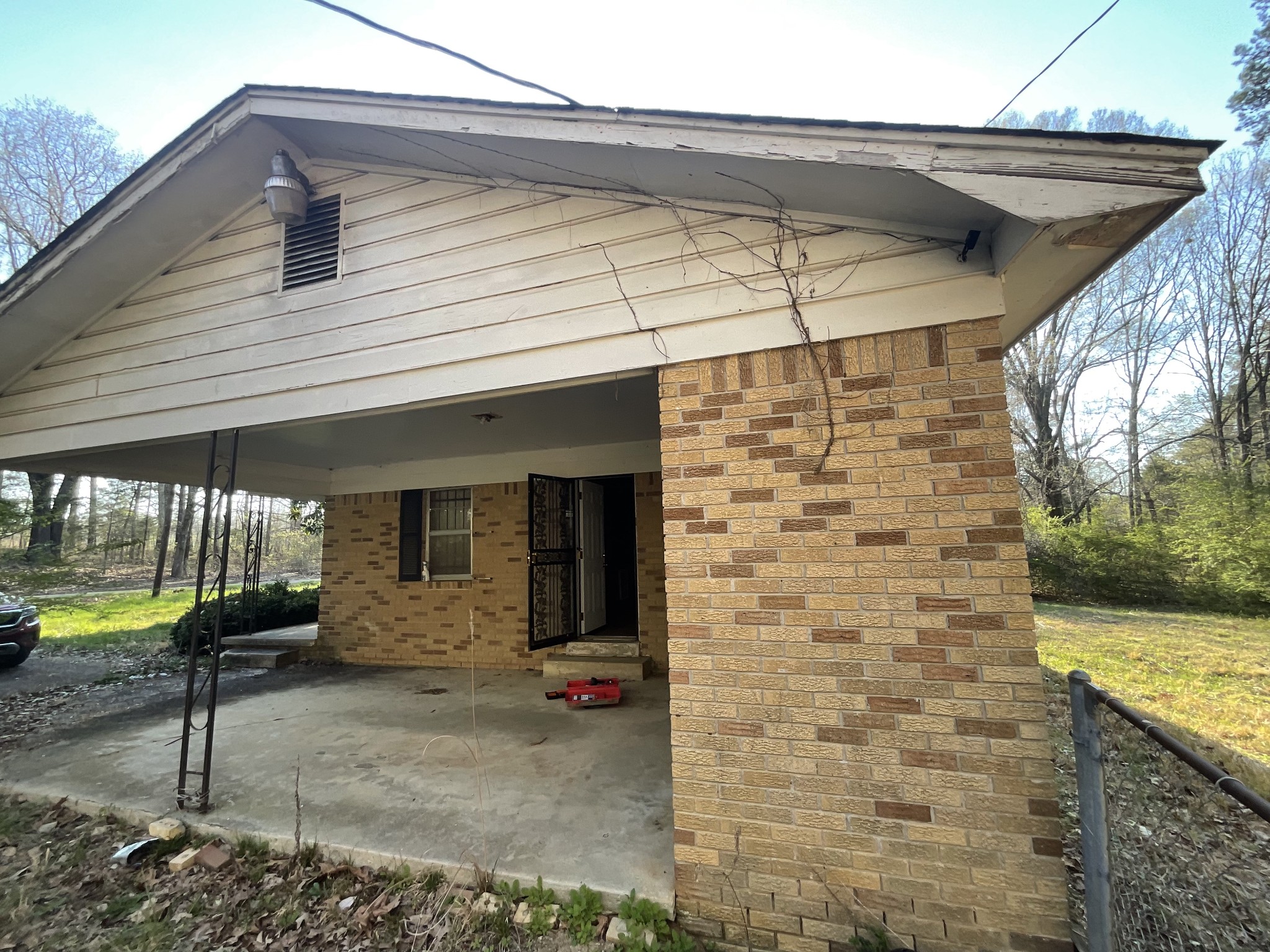 1035 Rube Scott Road Grand Junction, TN 38039 - Photo 5 of 22 a front view of a house with a garden