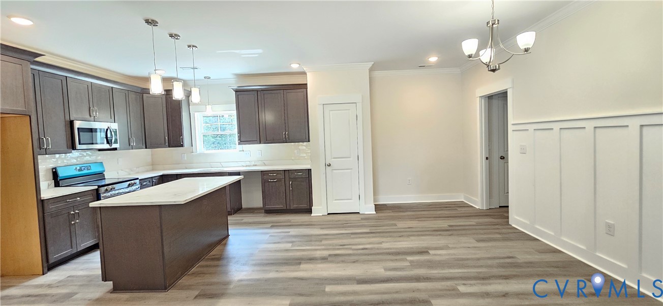 2982 Ashdale Road Center Cross, VA 22437 - Photo 12 of 17 Open-concept kitchen and living area featuring woo