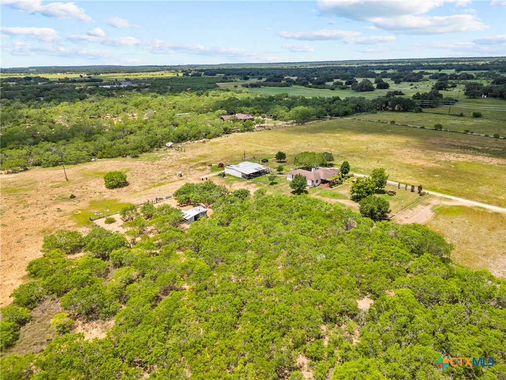 425 Old Pleasanton Road Poteet, TX 78065 - Photo 34 of 38 a view of a lake with houses in the back