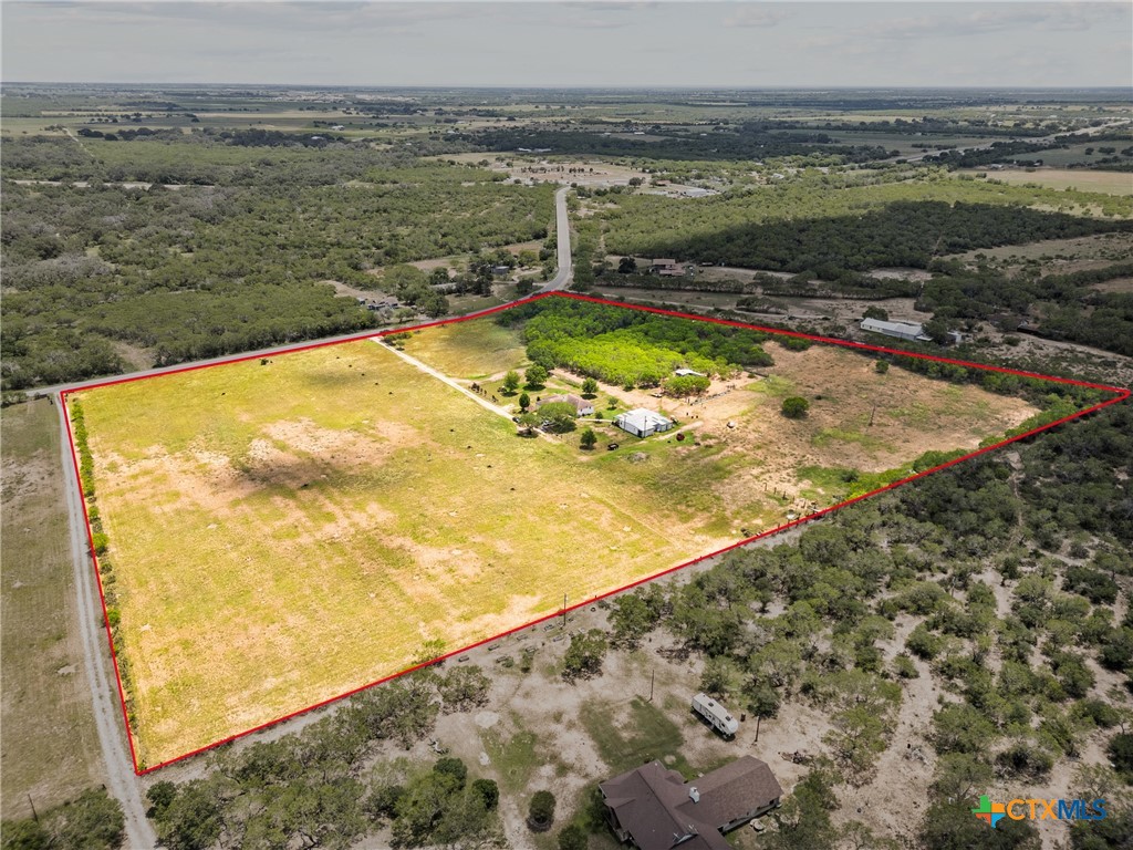 425 Old Pleasanton Road Poteet, TX 78065 - Photo 37 of 38 a view of a swimming pool with an ocean view