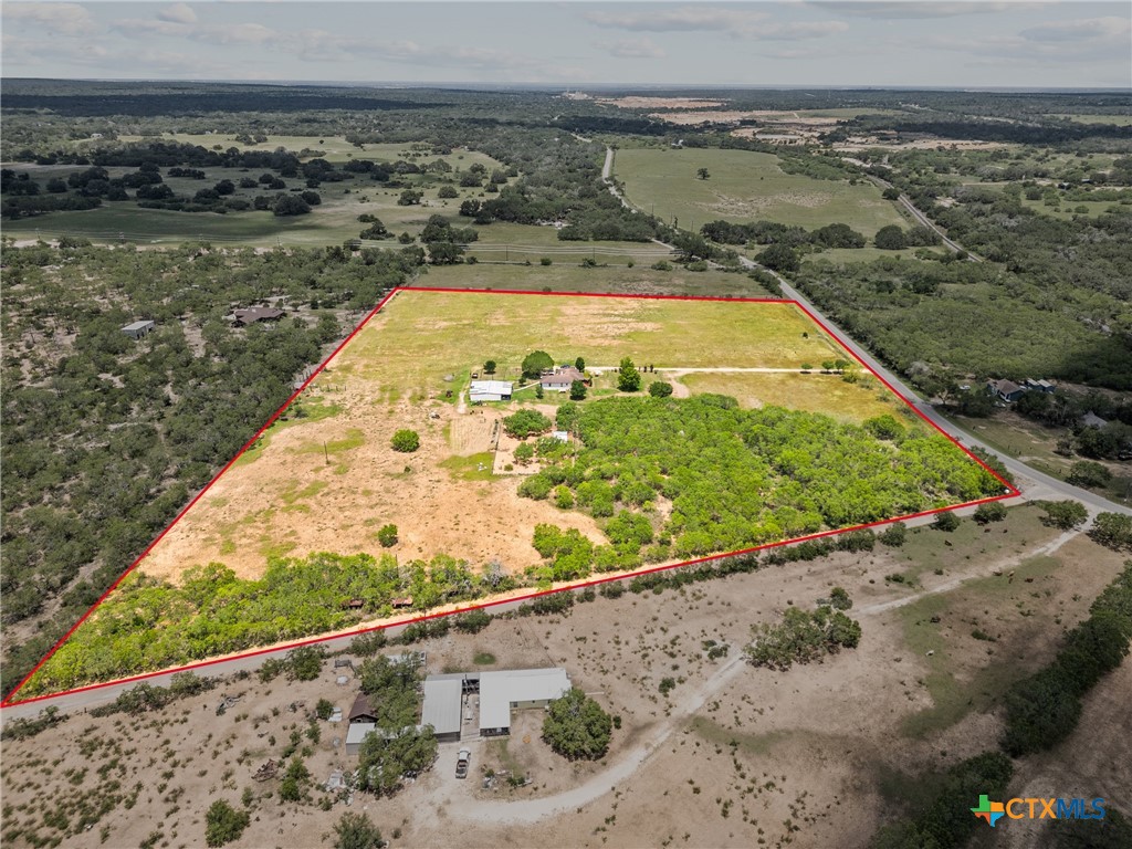 425 Old Pleasanton Road Poteet, TX 78065 - Photo 38 of 38 a view of a swimming pool with a lake view