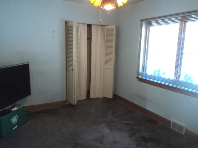 161 Gage Road Riverside, IL 60546 - Photo 17 of 32 an empty room with windows and closet