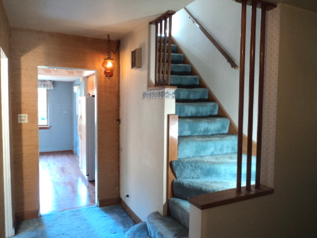 161 Gage Road Riverside, IL 60546 - Photo 18 of 32 a view of entryway and hall with wooden floor