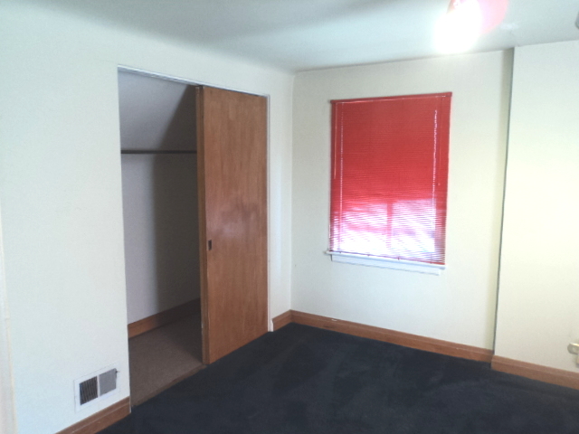 161 Gage Road Riverside, IL 60546 - Photo 19 of 32 an empty room with windows and closet