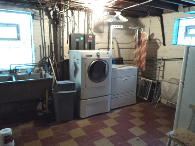 161 Gage Road Riverside, IL 60546 - Photo 31 of 32 a utility room with dryer and washer