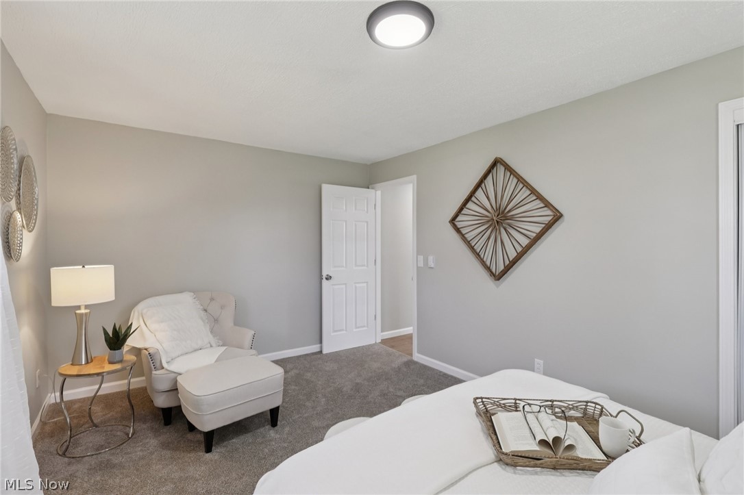 7412 Hopkins Road Mentor, OH 44060 - Photo 18 of 36 Carpeted bedroom featuring baseboards