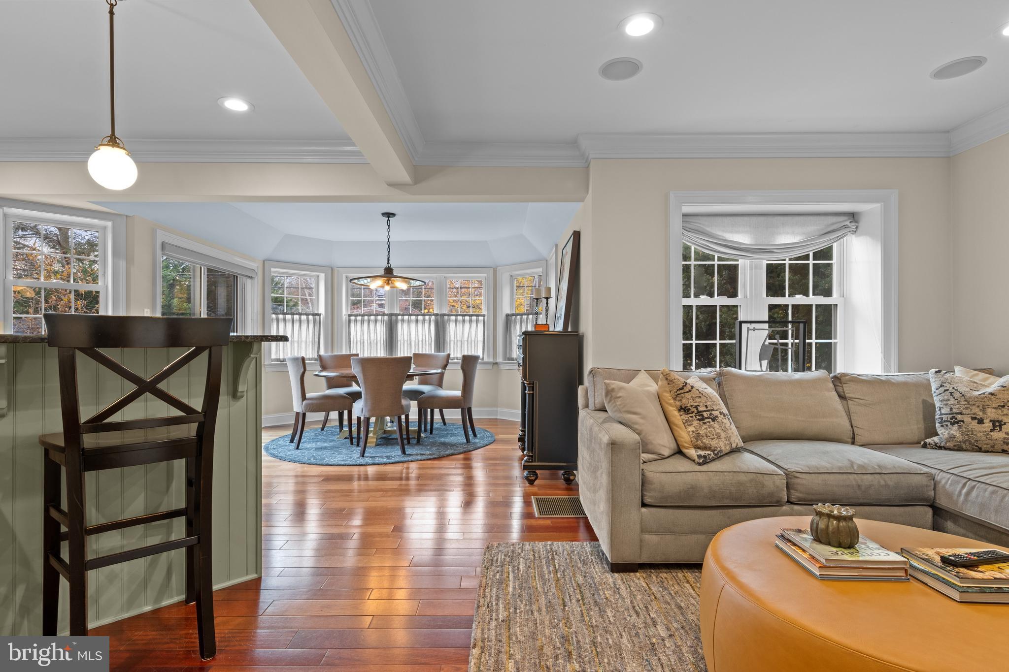 330 Dudley Avenue Narberth, PA 19072 - Photo 8 of 21 a living room with furniture a ceiling fan and a window