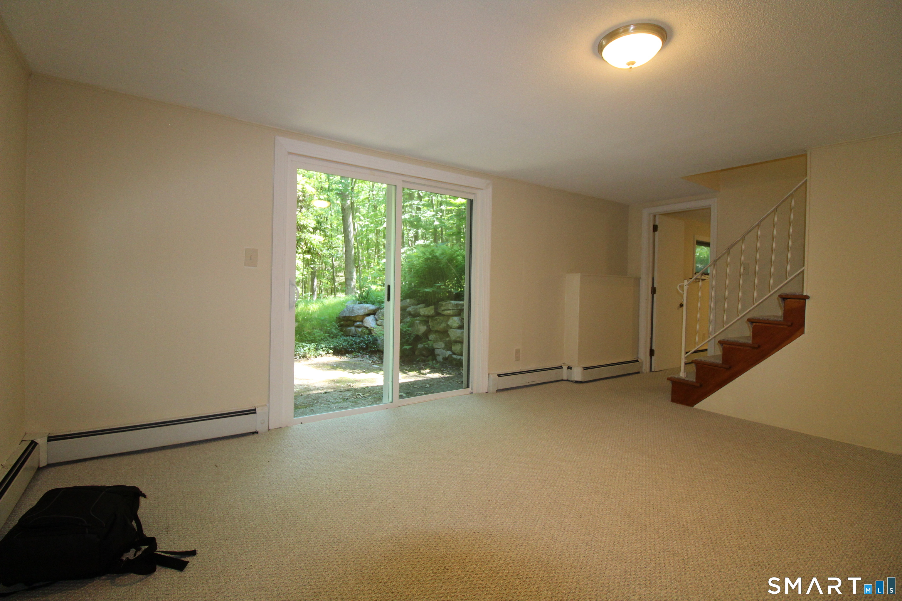 67 Mulberry Road Mansfield, CT 06250 - Photo 22 of 27 New walk out patio door and carpet