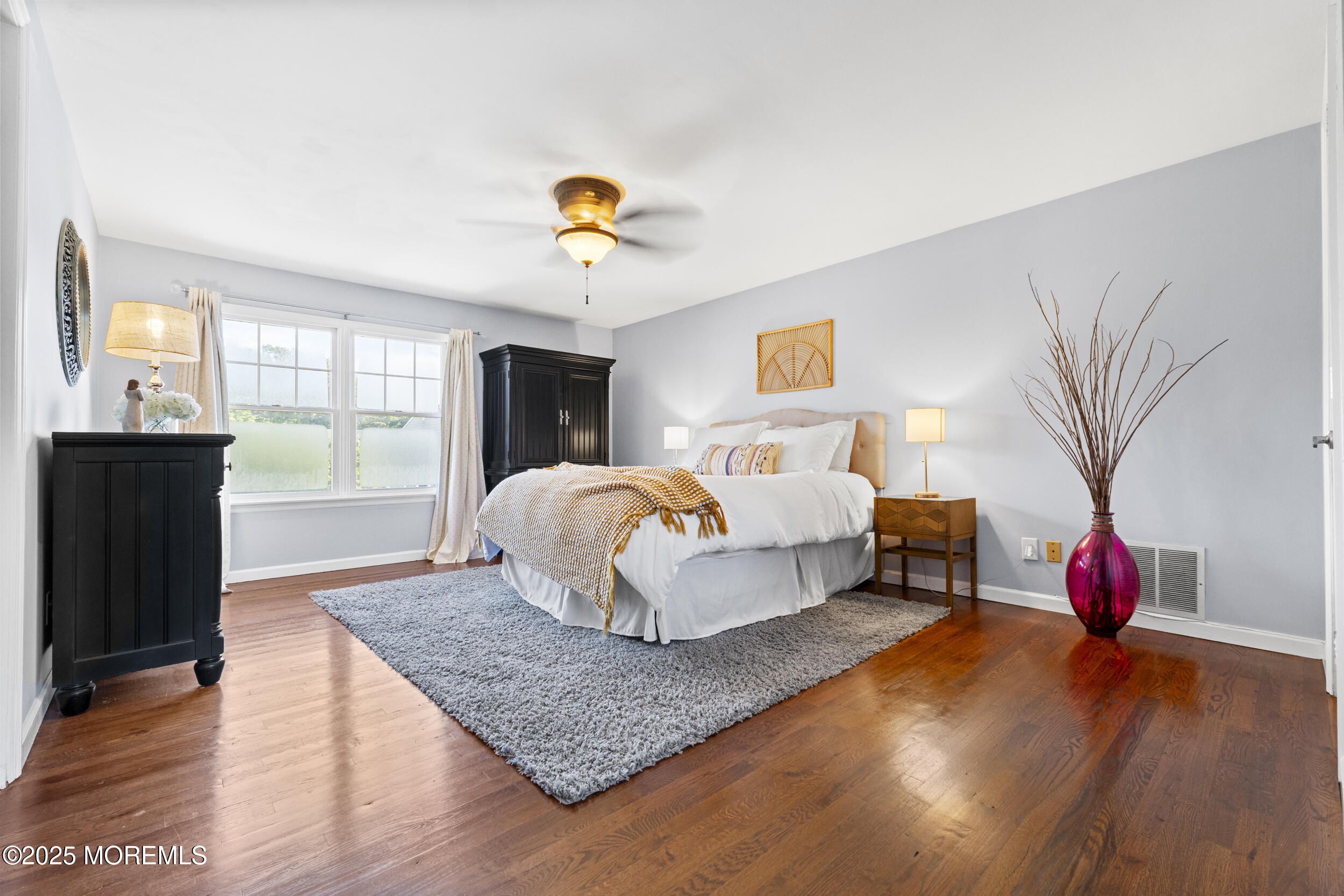 47 Yellowstone Lane Howell, NJ 07731 - Photo 21 of 47 a bedroom with a bed and wooden floor