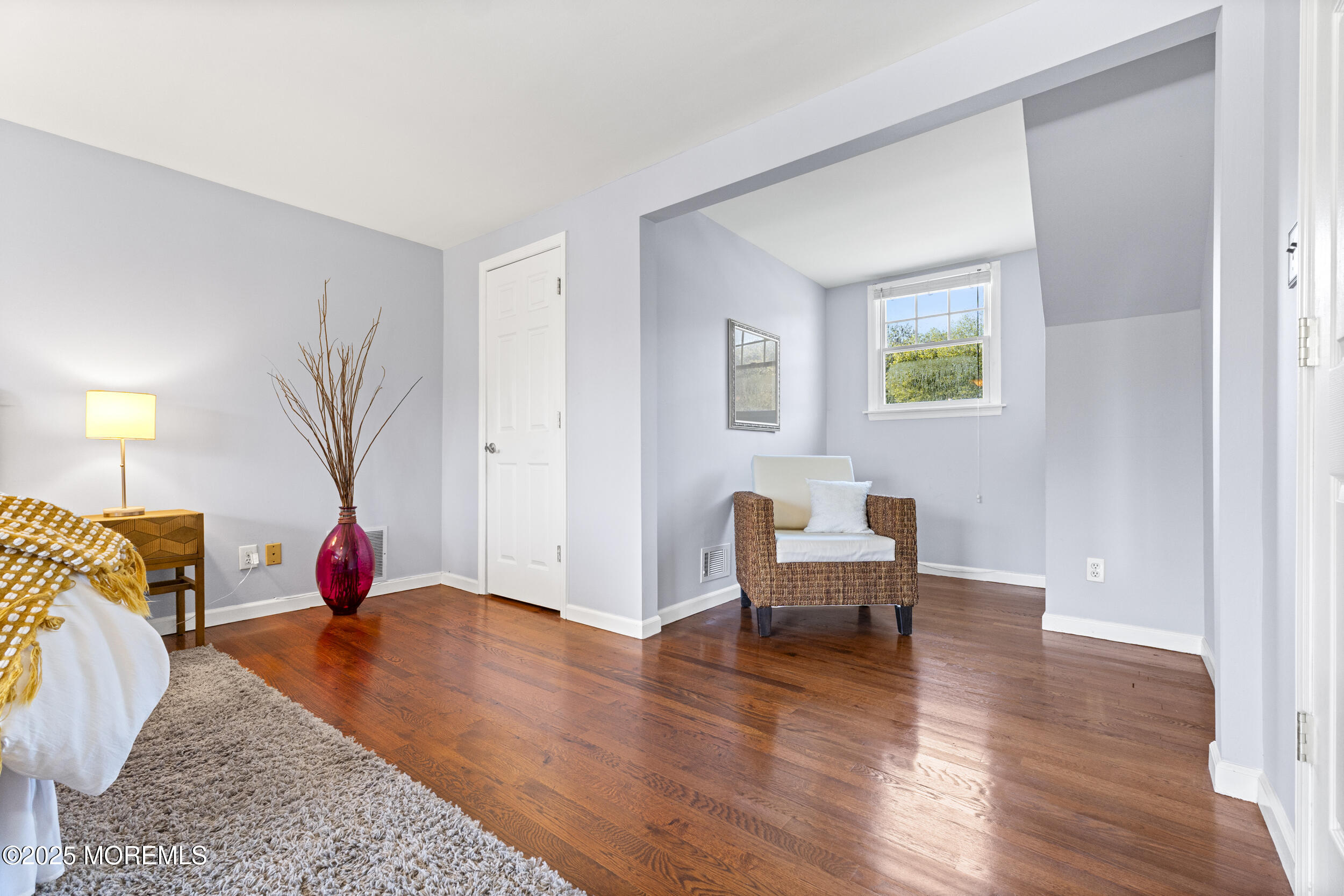 47 Yellowstone Lane Howell, NJ 07731 - Photo 22 of 47 a living room with furniture and wooden floor