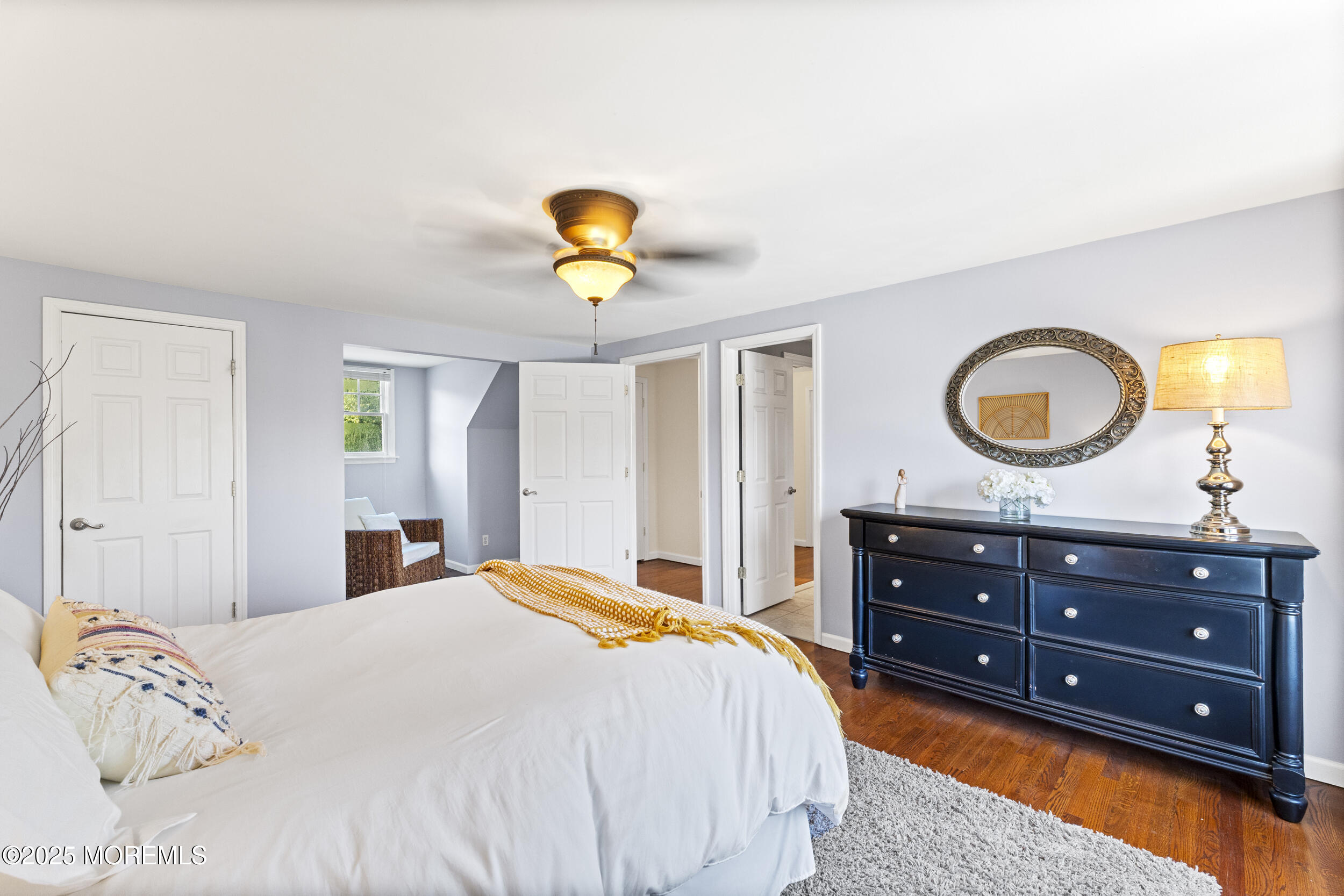 47 Yellowstone Lane Howell, NJ 07731 - Photo 24 of 47 a bedroom with a bed and a chandelier