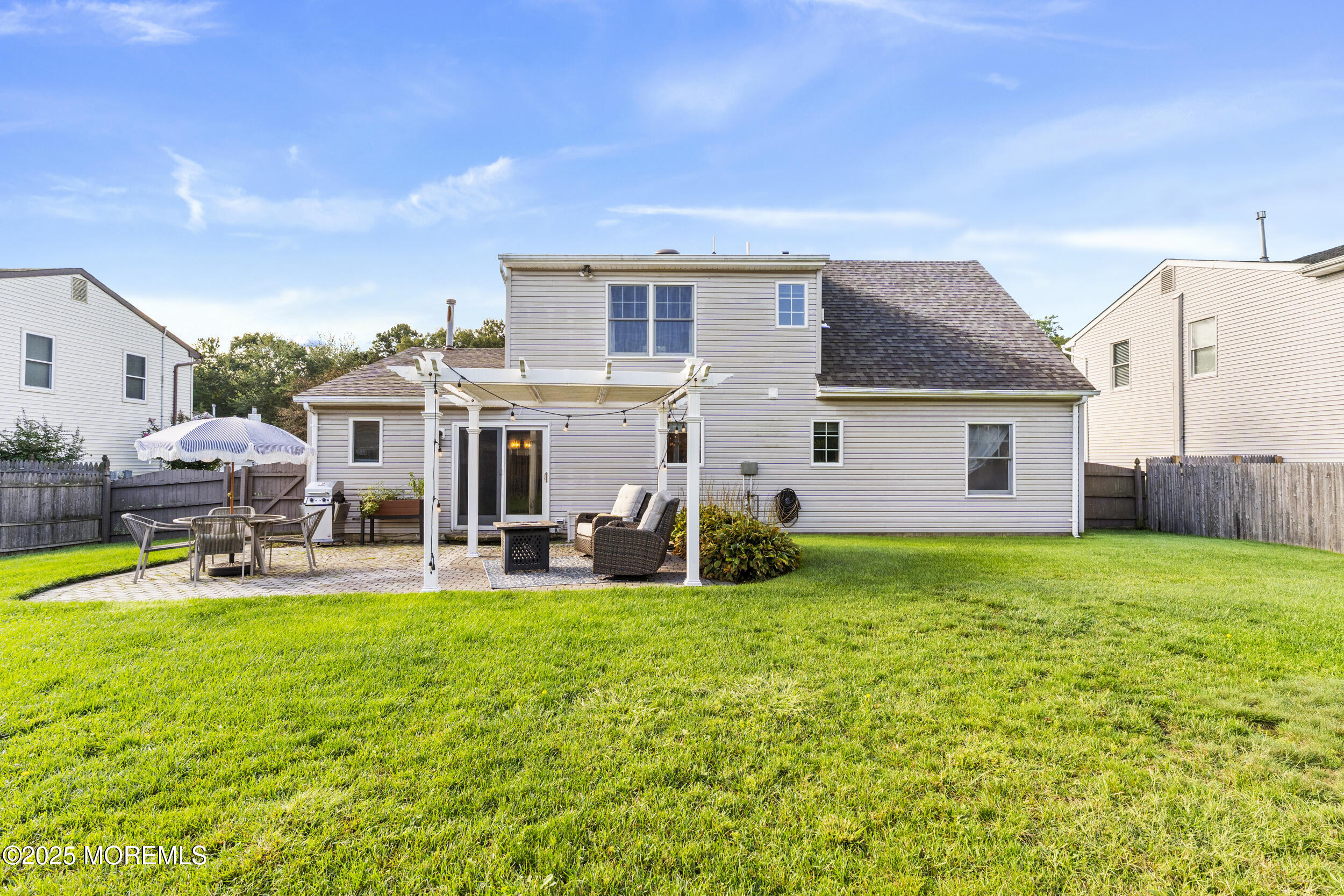 47 Yellowstone Lane Howell, NJ 07731 - Photo 36 of 47 a view of a house with backyard porch and sitting area