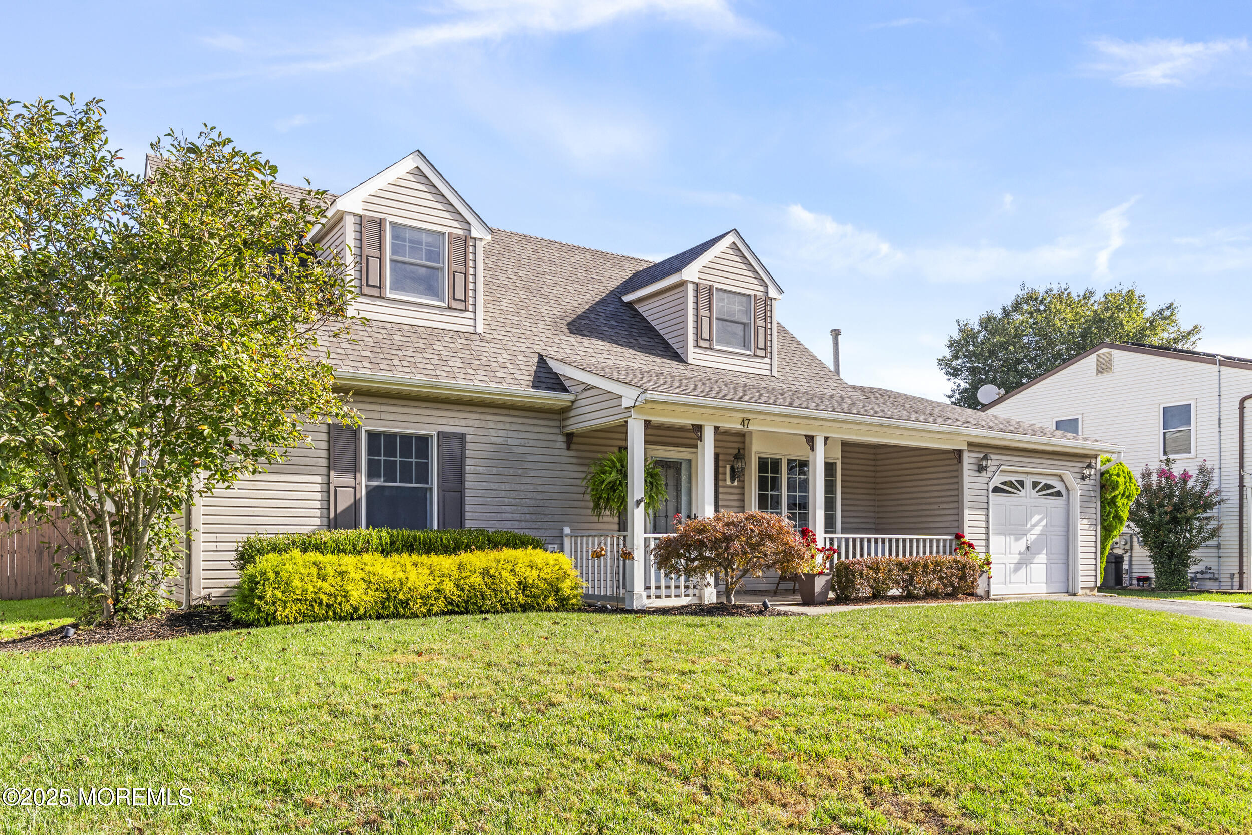 47 Yellowstone Lane Howell, NJ 07731 - Photo 4 of 47 front view of a house with a yard