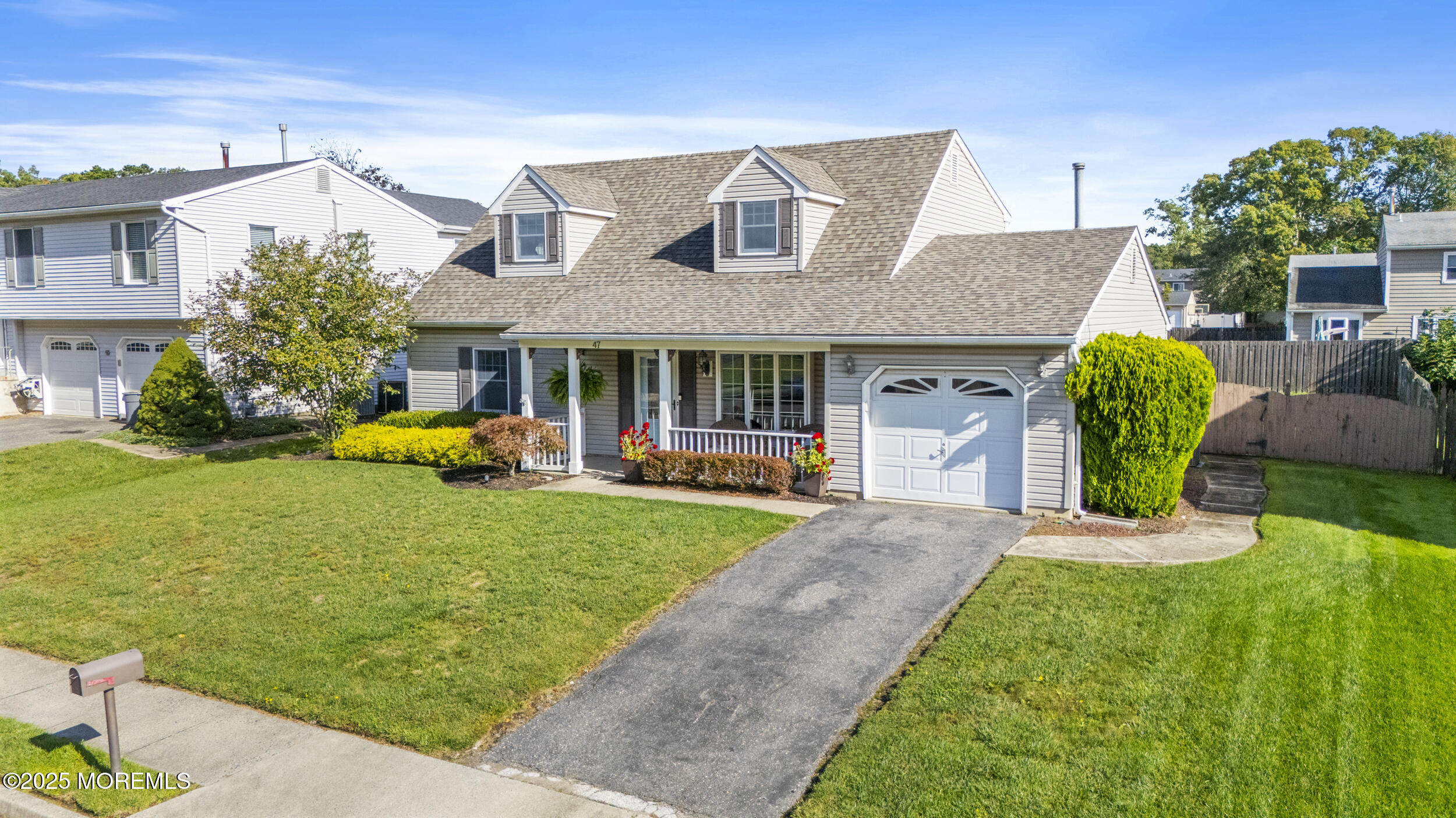 47 Yellowstone Lane Howell, NJ 07731 - Photo 43 of 47 a front view of a house with garden