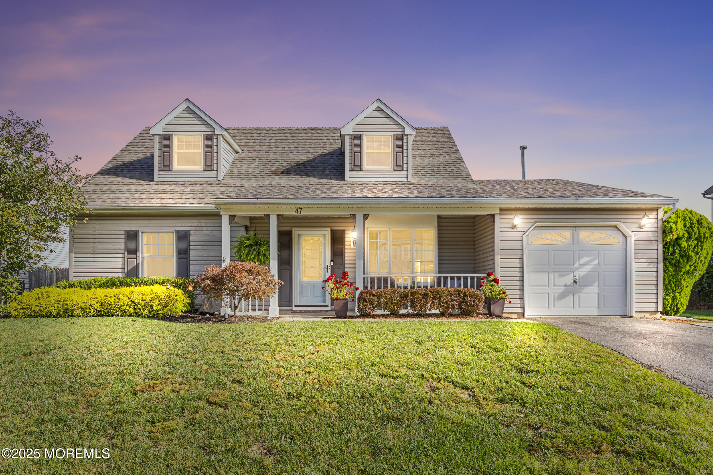 47 Yellowstone Lane Howell, NJ 07731 - Photo 45 of 47 a front view of house with yard and green space