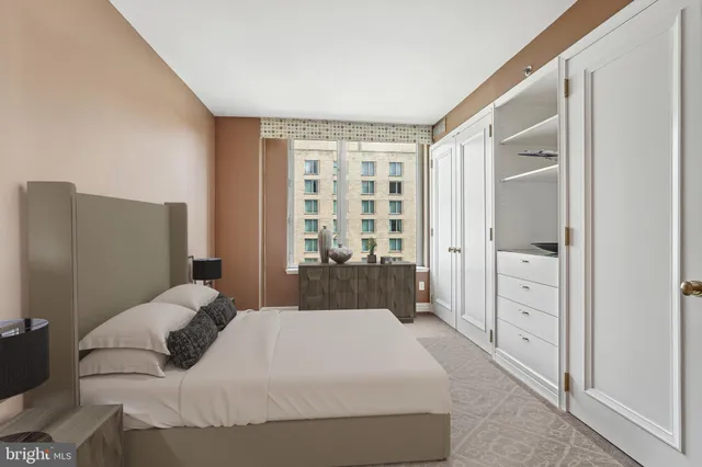 a bathroom with a sink mirror toilet and bathtub