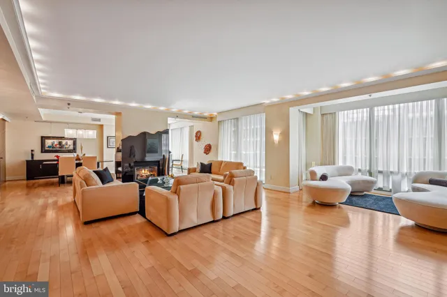 a kitchen with granite countertop wooden cabinets a sink and dishwasher