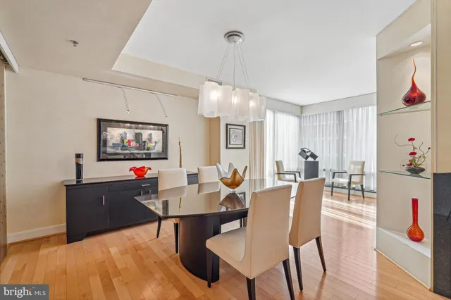 a living room with furniture and large window